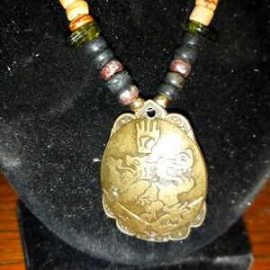 Brass dragon Stone and wood beaded neckless